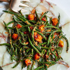 Pesto green beans with roasted baby tomato